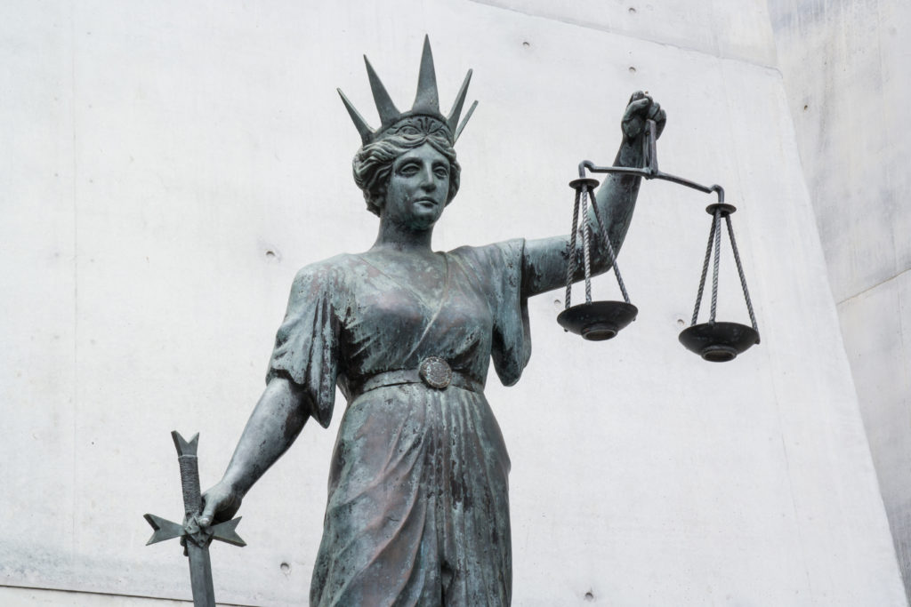 statue of Themis outside the law courts